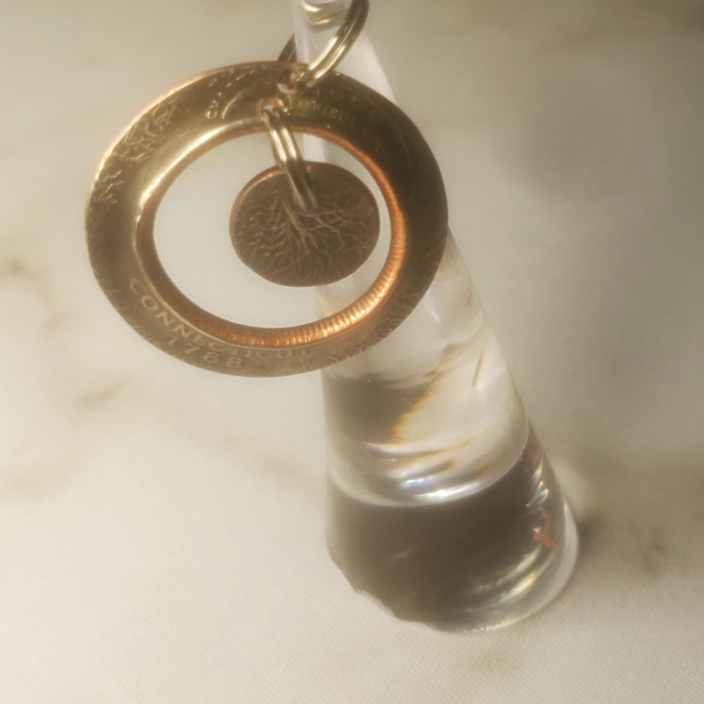 Inside out quarter dollar with punch pendent beautiful piece of jewelry